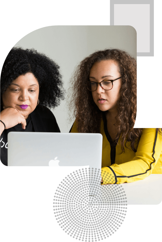 Two women working together